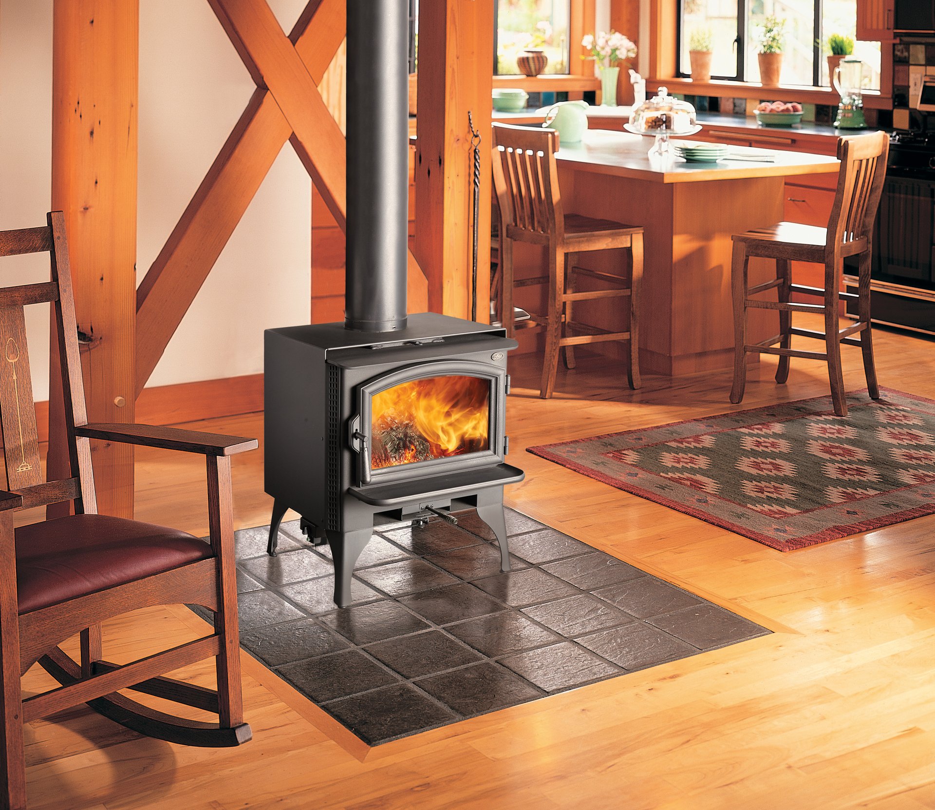 Lopi classic black wood stove in country kitchen
